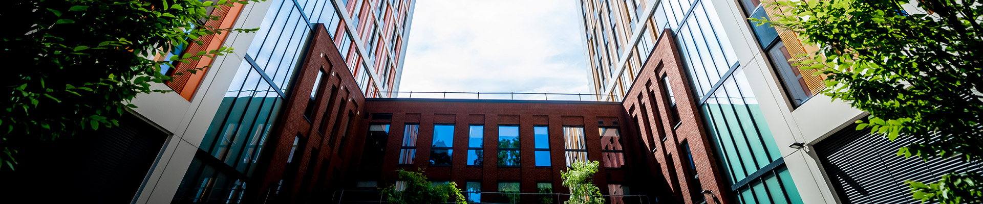 Looking up towards Bishop Gate accommodation, with yellow and orange cladding