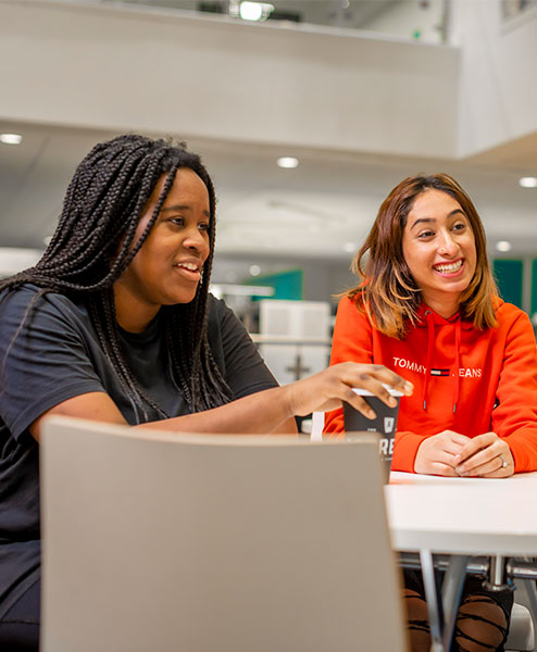 students sitting together in a study space
