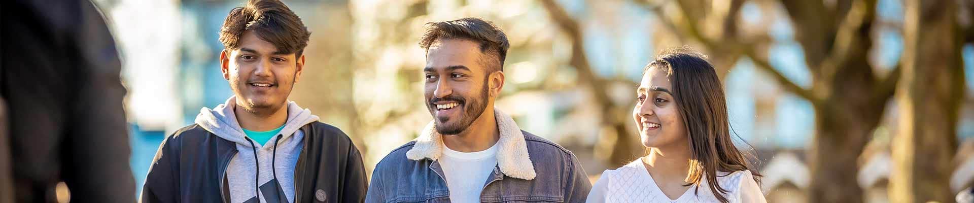 A smiling student looking straight at the camera
