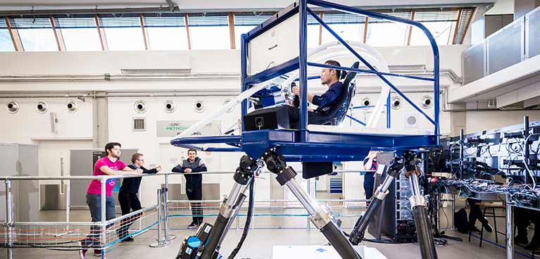 Cruden F1 Simulator Formula one simulator being used by young students