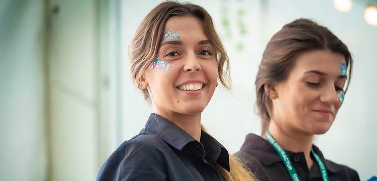 Two smiling female students